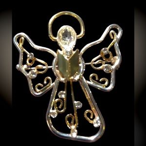 Gold tone and silver Angel brooche
